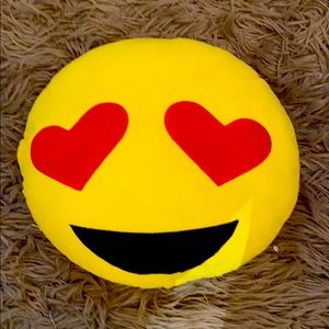 I’m selling an emoji pillow with heart eyes